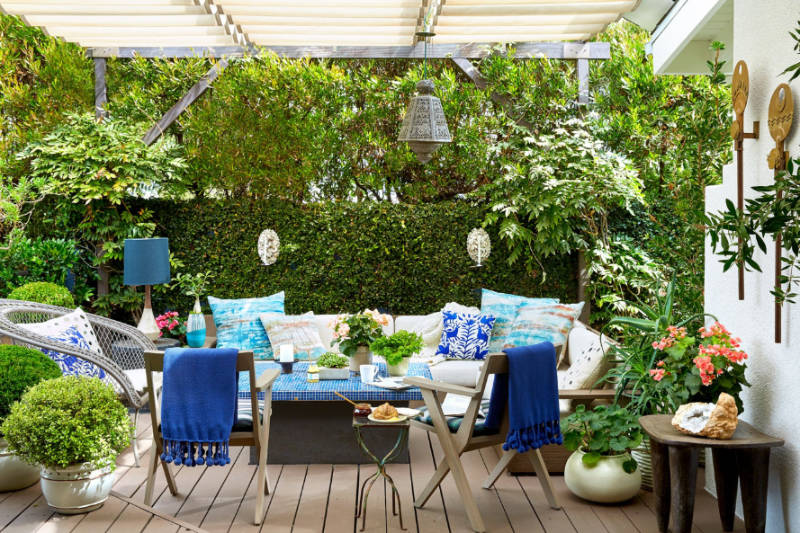 Added nature always makes the backyard look more lively. Source: House Beautiful
